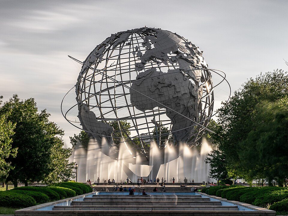 The Unisphere, a giant steel globe, with fountains in front of it in Flushing Meadows, Queens